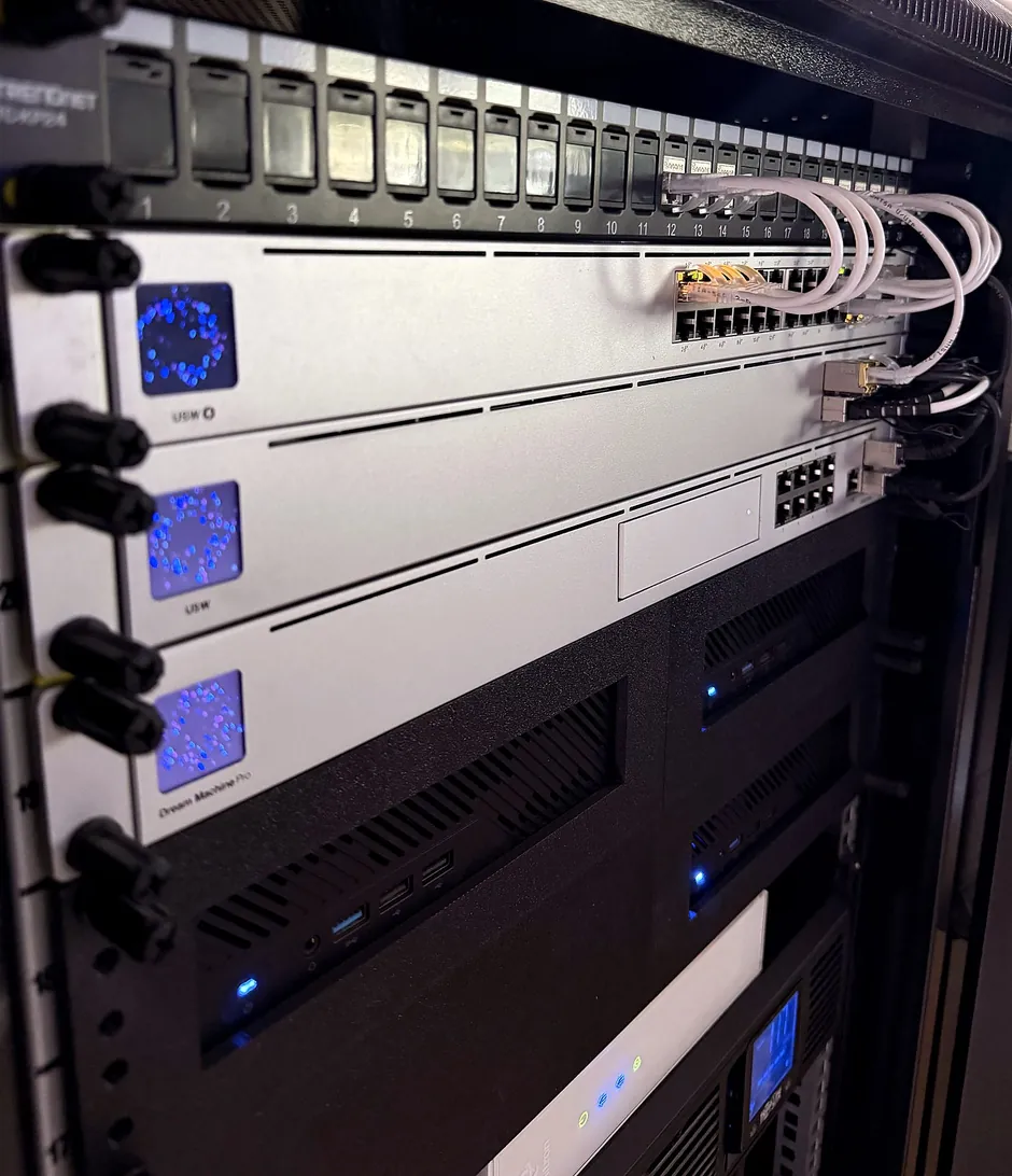 Managed IT network rack with UniFi switches and gateway installed by Community Computing